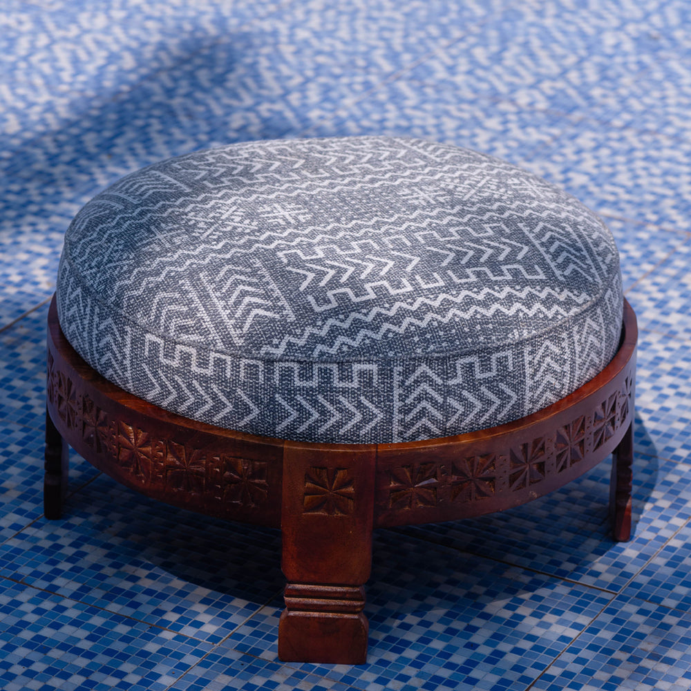 Round Carved Upholstered Wooden Poof