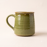 Vibrant Trails: The Green Streaked Coffee Mug