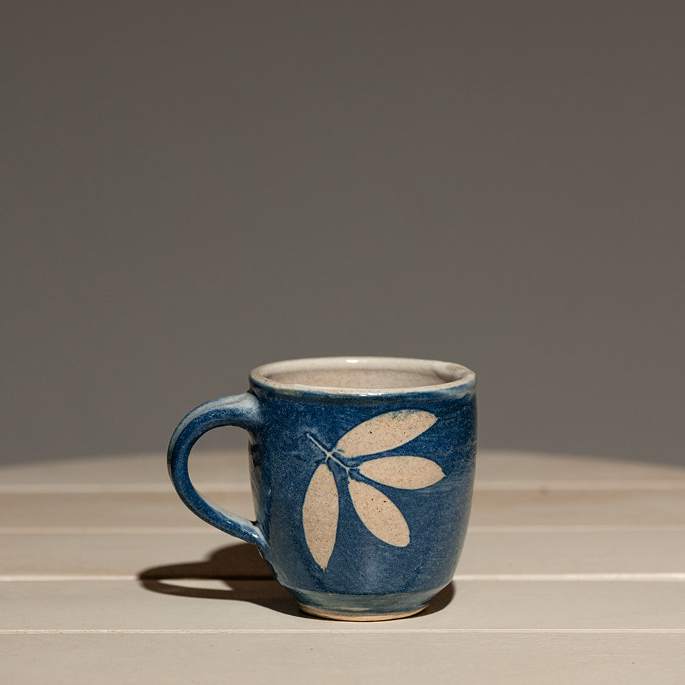 Four Leaf Tea Cup